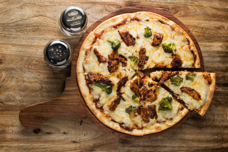 Pulled Pork BBQ ranch specialty pie with coleslaw and pickled red onion