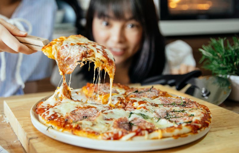 Four Cheese ranch pizza with mozzarella provolone cheddar parmesan